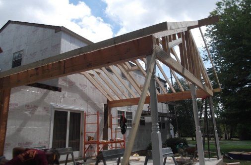 home addition in process showing roof framing